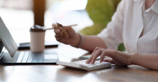 Two Ladies in discussion at a desk